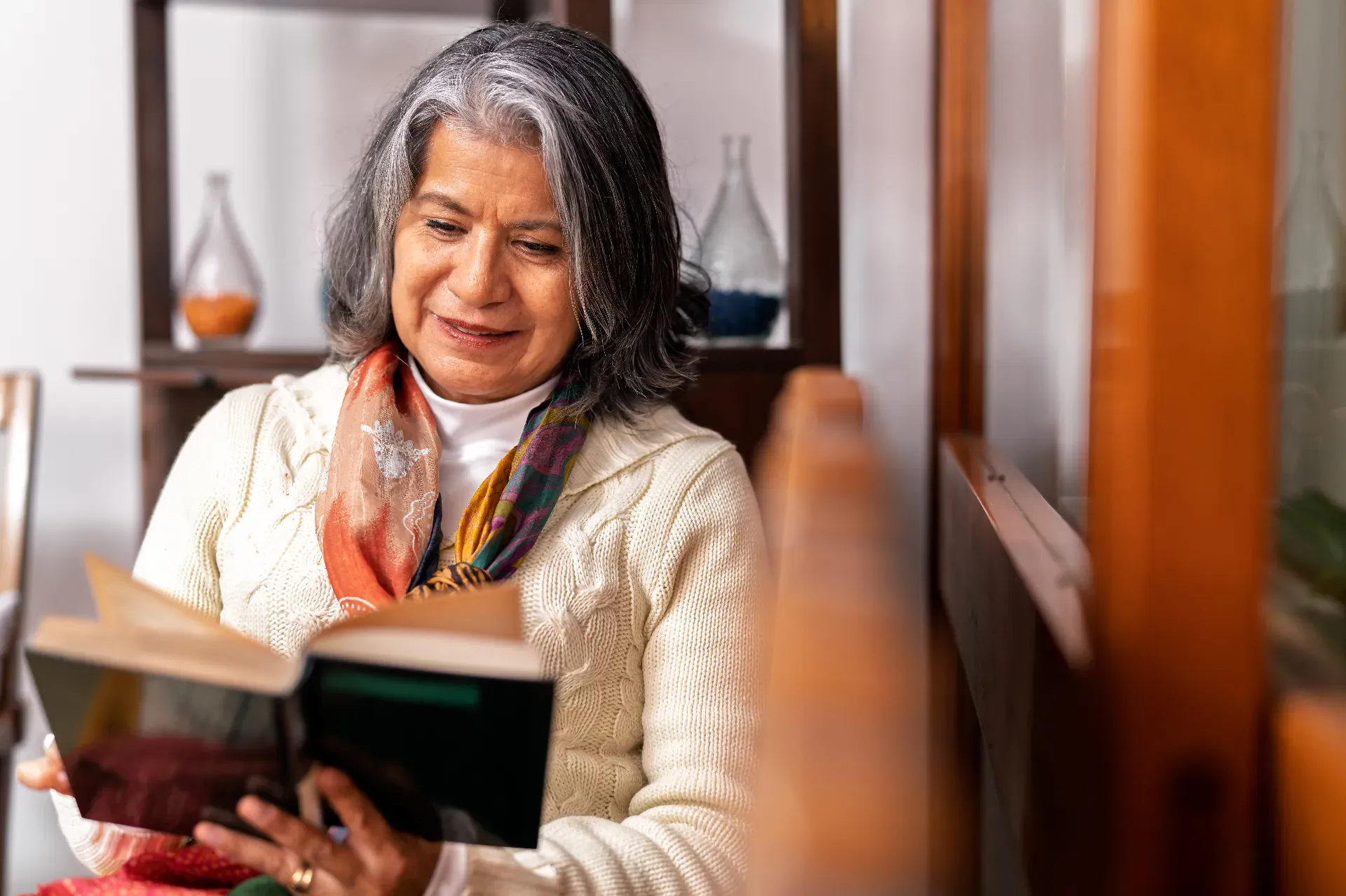Senior woman reading at home