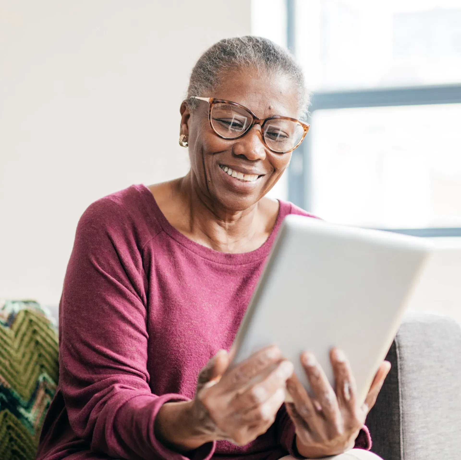 Senior woman holding a tablet